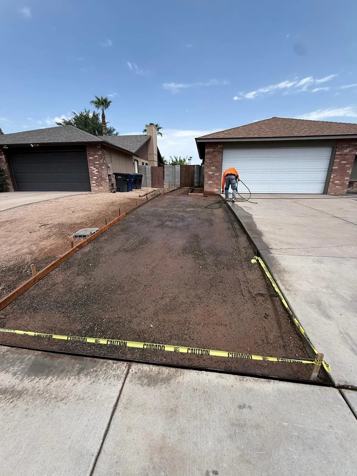 Old driveway removed and the base formed, graded and staked ready for a new concrete pour